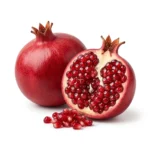 Fresh pomegranate anar with juicy red seeds isolated on white background